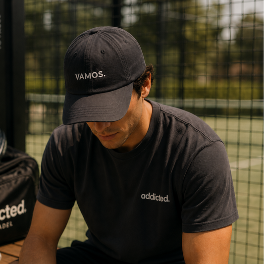 man on padel court with vamos baseball cap